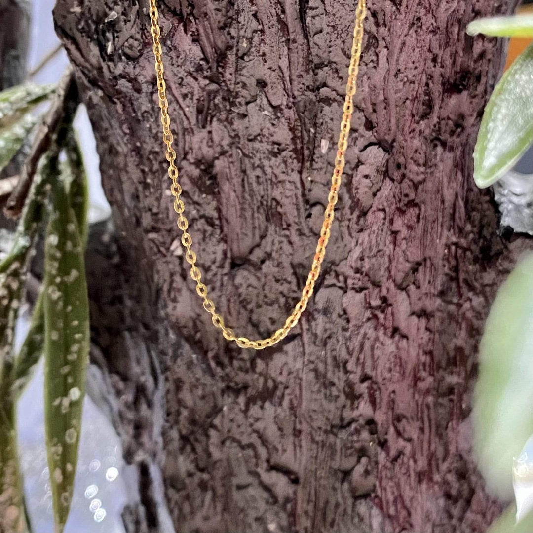 - Chaîne Rolo 030 en or jaune 10K