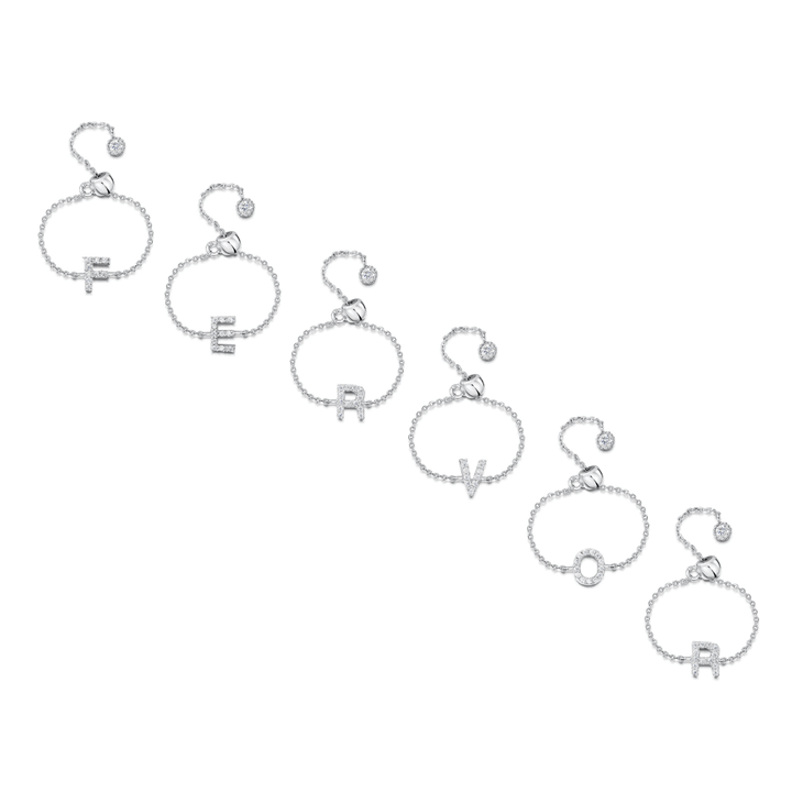 Fervor Montréal Bague lettre cz en argent 925 plaqué rhodium