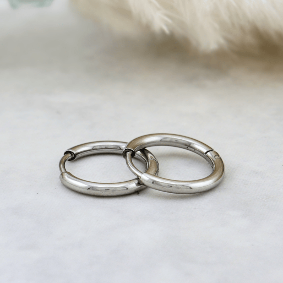 Boucles d'oreilles anneaux simples en acier inoxydable Mathieu Blanchard Boucles d'oreilles Acier inoxydable PBOAM20076S Anneaux Minimalistes en acier inox | Mathieu Blanchard  Mathieu Blanchard Joaillerie