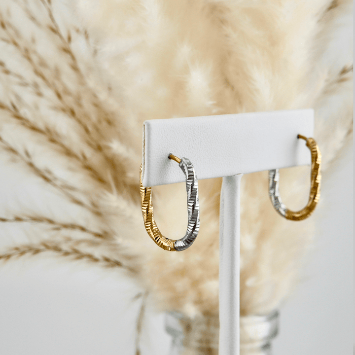 Mathieu Blanchard Boucles d'oreilles Boucles d'oreilles Huggies 2 tons en acier