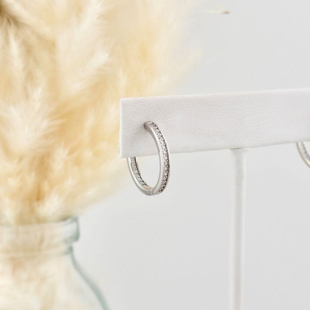 - Boucles d'oreilles Boucles d'oreilles huggies Éclats + en or 10K