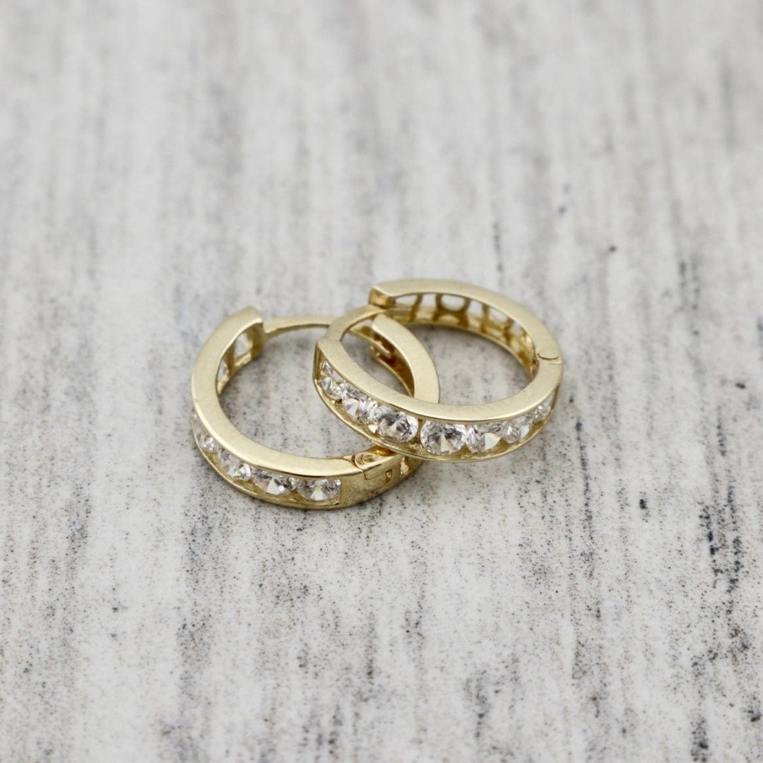 - Boucles d'oreilles Boucles d'oreilles huggies Éclats en or 10K
