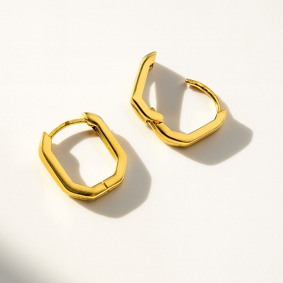 Boucles d'oreilles huggies Géométrique en or jaune 10K - Boucles d'oreilles Or jaune 10K 2894 Boucles d'oreilles huggies Fusion - Or jaune 10K | Mathieu Blanchard Mathieu Blanchard Joaillerie