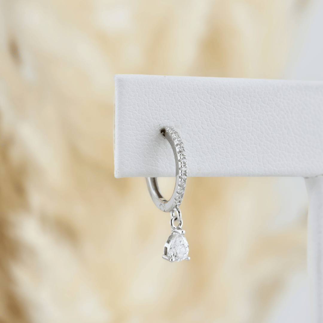 Boucles d'oreilles Huggies Gouttes en argent sterling Mathieu Blanchard Boucles d'oreilles Argent sterling PBOM16901S Boucles d'oreilles Huggies Gouttes en argent sterling | Mathieu Blanchard  Mathieu Blanchard Joaillerie
