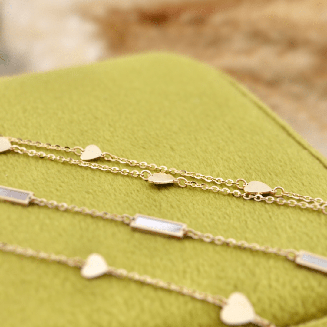 - Bracelet Double Coeurs en or 10K