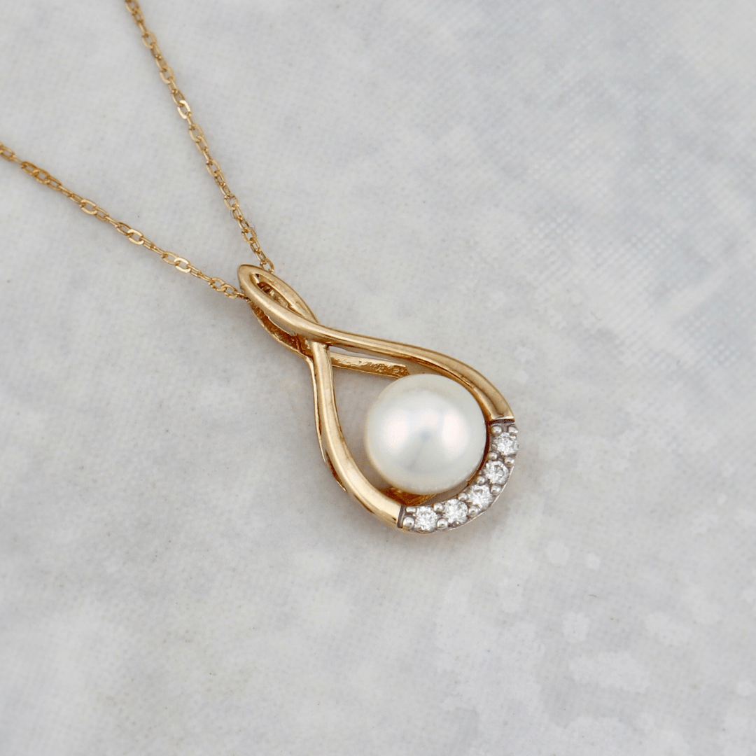 - Colliers Or jaune 10K Collier Orya en or 10K, perle et diamants