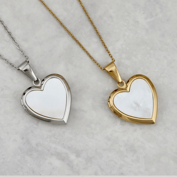 Collier porte photos Cœur en acier inoxydable Mathieu Blanchard Pendants Collier porte-photos Coeur en nacre de perle en acier inox Mathieu Blanchard Joaillerie