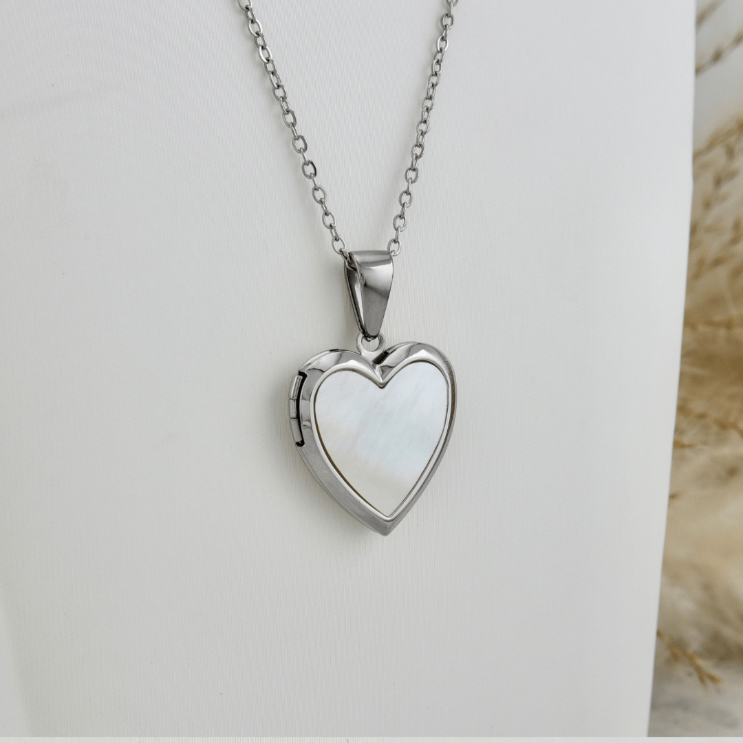 Collier porte photos Cœur en acier inoxydable Mathieu Blanchard Pendants Collier porte-photos Coeur en nacre de perle en acier inox Mathieu Blanchard Joaillerie