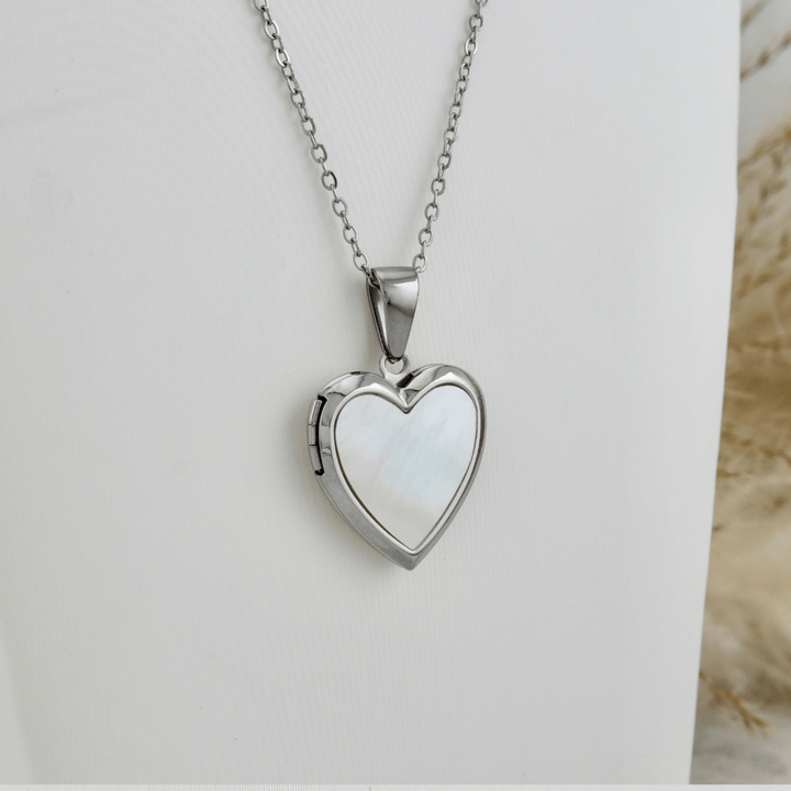 Collier porte photos Cœur en acier inoxydable Mathieu Blanchard Pendants Collier porte-photos Coeur en nacre de perle en acier inox Mathieu Blanchard Joaillerie