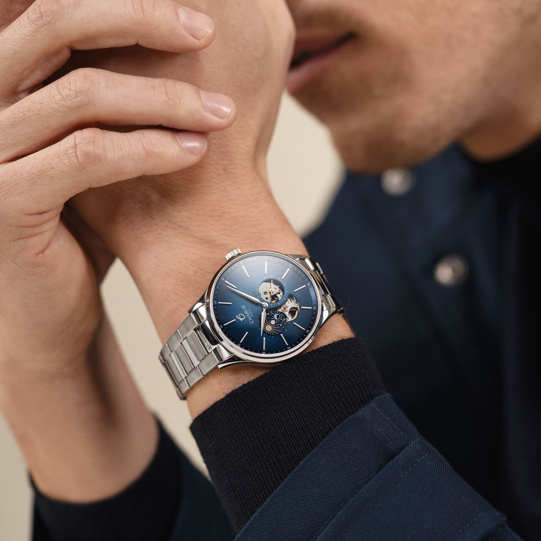 Montre Charlie Paris INITIAL Open Heart Jour/Nuit Bleu 40 mm en acier inoxydable Charlie Paris Montre Montre Charlie Paris INITIAL Open Heart Jour/Nuit - Bleu 40 mm | Dépositaire Officiel Canada | Mathieu Blanchard Joaillerie Mathieu Blanchard Joaillerie