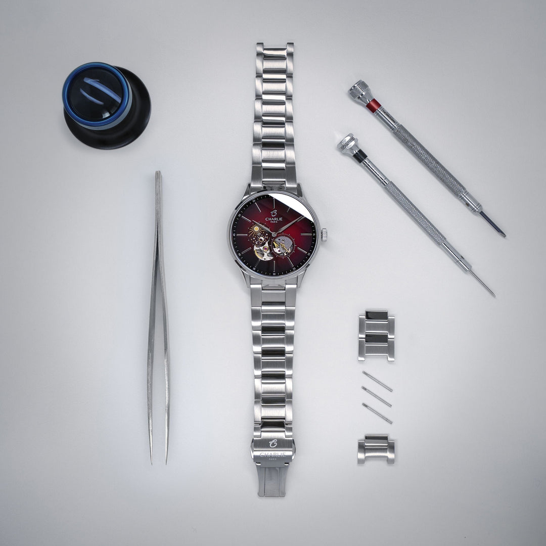 Montre Charlie Paris INITIAL Open Heart Jour/Nuit Bordeaux 40 mm en acier inoxydable Charlie Paris Montre Montre Charlie Paris INITIAL Open Heart Jour/Nuit - Bordeaux 40 mm | Dépositaire Officiel Canada | Mathieu Blanchard Joaillerie Mathieu Blanchard Joaillerie