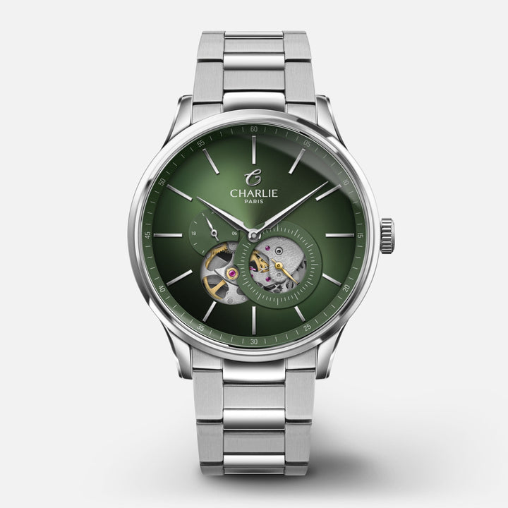 Montre Charlie Paris INITIAL Open Heart Sauge 40 mm en acier inoxydable Charlie Paris Montre 3-link stainless steel / Acier inoxydable ICO-40-015 / B-ICO / m-ICO Montre Charlie Paris INITIAL Open Heart - Sauge 40 mm | Dépositaire Officiel Canada | Mathieu Blanchard Joaillerie Mathieu Blanchard Joaillerie