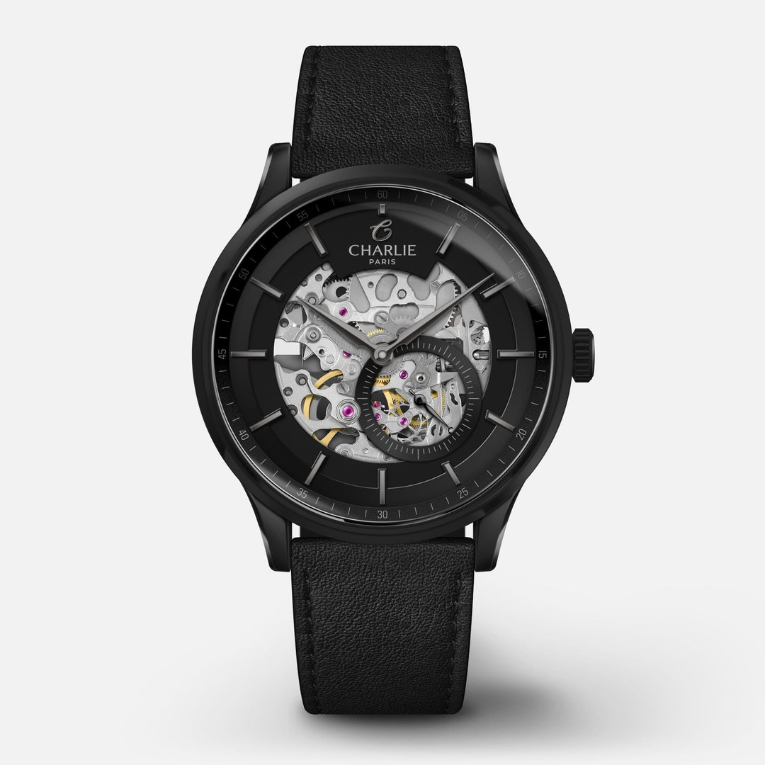Montre Charlie Paris INITIAL Squelette Fantôme 40 mm en acier inoxydable Charlie Paris Montre Cuir noir / Acier inoxydable ISQ-40-021 / B20-104-C Montre Charlie Paris INITIAL Squelette - Fantôme 40 mm | Dépositaire Officiel Canada | Mathieu Blanchard Joaillerie Mathieu Blanchard Joaillerie