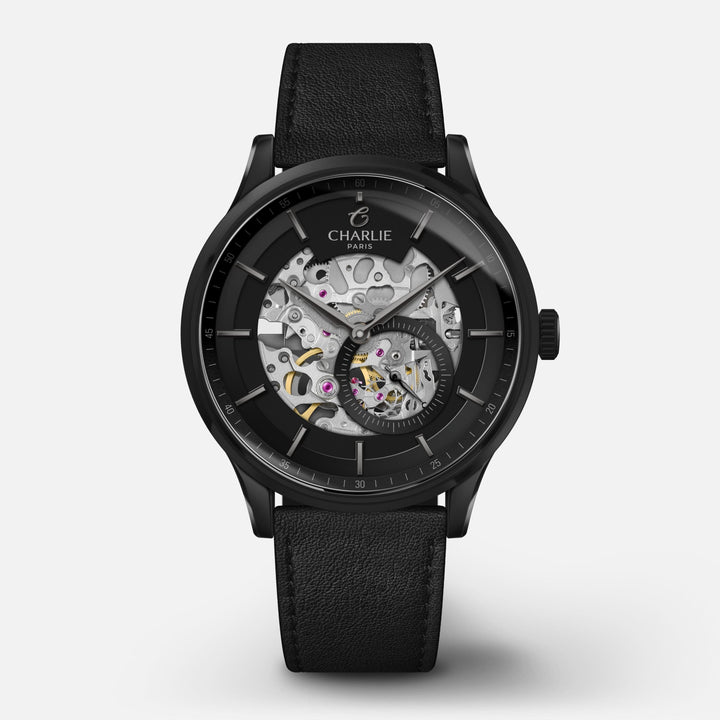 Montre Charlie Paris INITIAL Squelette Fantôme 40 mm en acier inoxydable Charlie Paris Montre Cuir noir / Acier inoxydable ISQ-40-021 / B20-104-C Montre Charlie Paris INITIAL Squelette - Fantôme 40 mm | Dépositaire Officiel Canada | Mathieu Blanchard Joaillerie Mathieu Blanchard Joaillerie