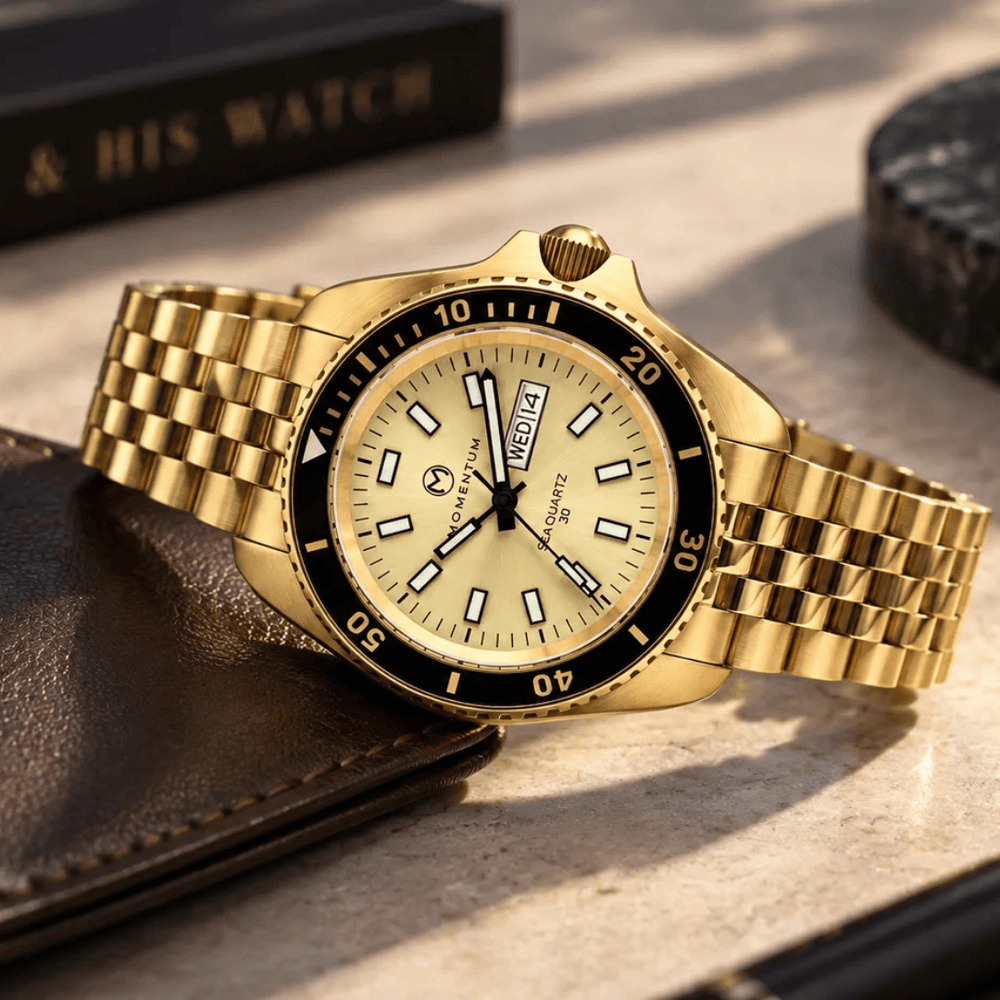 Montre Momentum Champagne Sea Quartz 30 - 42mm Momentum Montre Acier inoxydable plaqué or jaune 081AADBFC-EL-B-BK-B-BK-AGK-BH-AG-B-K10 Montre Champagne Sea Quartz 30 - 42mm - Dépositaire officiel Momentum Canada Mathieu Blanchard Joaillerie