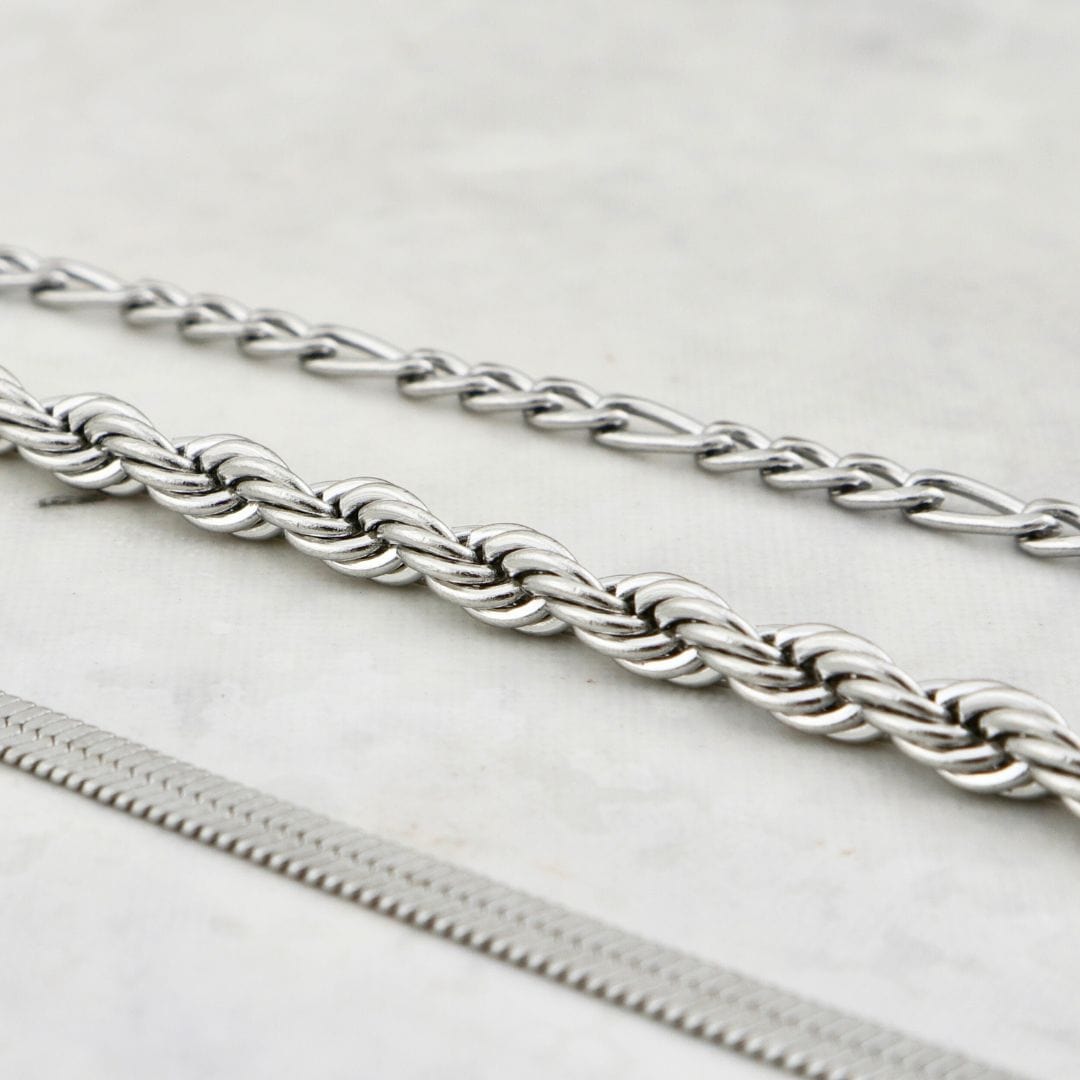 Trio de bracelets La Force en acier inoxydable Mathieu Blanchard Bracelets Acier inoxydable PTRM13022S Trio de bracelets Torsade - Figaro en acier inoxydable - unisexe Mathieu Blanchard Joaillerie