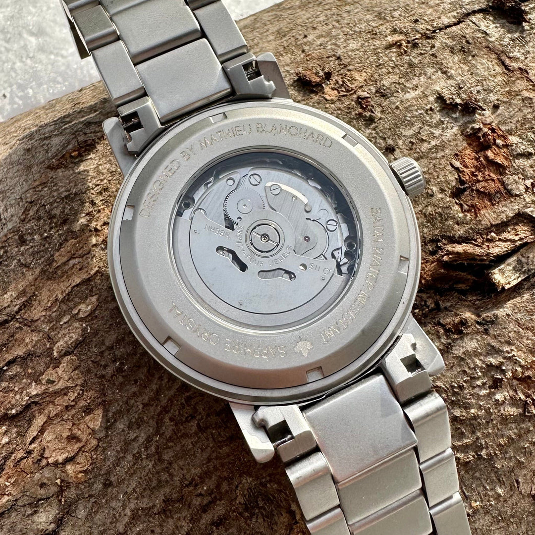Mathieu Blanchard Montres Chêne provenant de baril de whisky Montre Copernic en bois de baril de whisky recyclé
