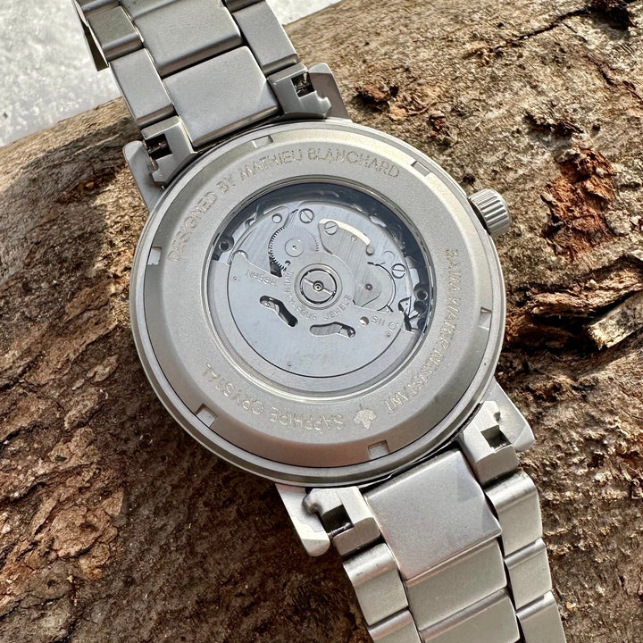 Mathieu Blanchard Montres Chêne provenant de baril de whisky Montre Copernic en bois de baril de whisky recyclé