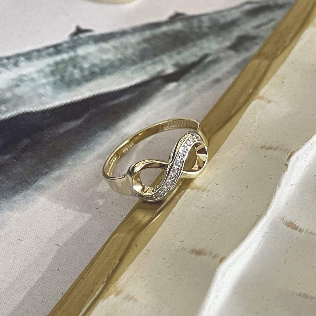 RPM Bague infini CZ en or jaune ou blanc 10K